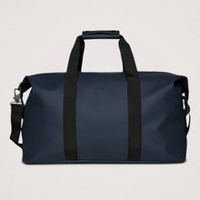 Load image into Gallery viewer, Front panel view of the navy blue duffle bag. 
