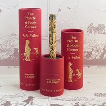 Load image into Gallery viewer, The fountain pen featuring E.H. Shepard&#39;s classic black line art illustrations of beloved animal characters on a honey-colored barrel with antique brass accents.
