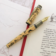 Load image into Gallery viewer, The uncapped fountain pen, featuring a steel nib in gold tone in a light background.
