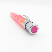 Load image into Gallery viewer, A close-up of the pink top disc of the pen, featuring chrome accents on a white background.
