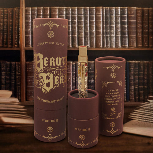 Pen with commemorative tube packaging in front of a bookshelf.