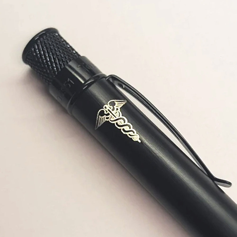 Retro 51 Stealth Black Matte rollerball with Caduceus engraving on a light background.