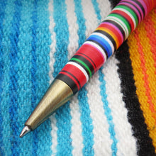Load image into Gallery viewer, A close-up of the tip of the pen on top of a colored texturized background.
