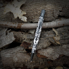 Load image into Gallery viewer, Wolf rescue pen with wolf design on a textured wooden surface
