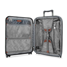 Load image into Gallery viewer, Interior view, featuring zipper-closing compartments and adjustable straps. 
