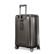 Load image into Gallery viewer, Angled back panel view of the hard shell graphite suitcase. It features an ID tag compartment 
