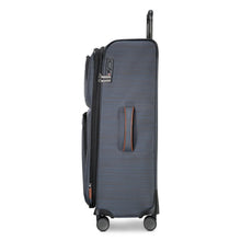 Load image into Gallery viewer, Side panel view of the gray soft sided suitcase. It features a grab handle and a TSA approved, three-digit combination lock. 
