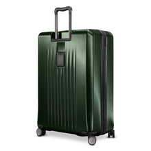 Load image into Gallery viewer, Angled back panel view of the green hard shell suitcase. 
