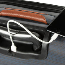 Load image into Gallery viewer, Close up to a phone charging from the USB slot under the telescoping handle. Battery bank sold separately. 
