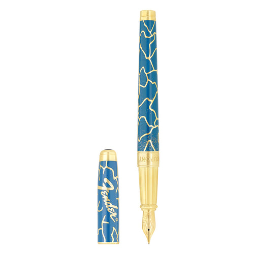 Front view of the blue fountain pen with the cap set to the side. 