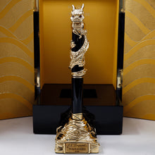 Load image into Gallery viewer, Front view of the pen on the stand. The presentation box stands opened behind it. 
