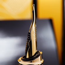 Load image into Gallery viewer, Close up to the side of the fountain pen nib on a blurred background. 
