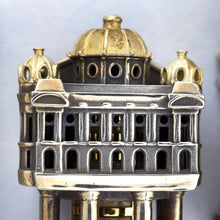 Load image into Gallery viewer, Close up to the side of the Opera White House. Some patina is shown on the bronze. 
