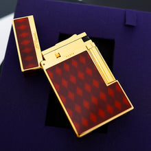 Load image into Gallery viewer, The front of the lighter, open, with a red and brown argyle-patterned body, on a purple surface.
