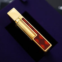Load image into Gallery viewer, A side view of the lighter showing the ignition wheel.
