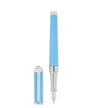 Load image into Gallery viewer, Front view of the turquoise fountain pen with the cap next to it.
