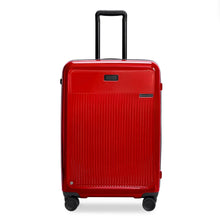 Load image into Gallery viewer, Front view of the red suitcase with black accents. The telescopic handle is extended. 
