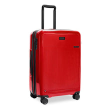 Load image into Gallery viewer, Angled front view of the red suitcase with black accents. The telescopic handle is extended.
