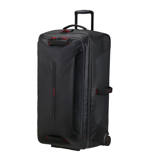 Angled front view of the black suitcase with the telescopic partly extended. 