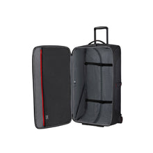 Load image into Gallery viewer, Interior view of the black suitcase. The lid offers a zipper-closing compartment. The back panel a set of adjustable straps to hold your contents. 
