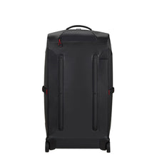 Load image into Gallery viewer, Back panel view of the black suitcase. it features two vertical stubs to keep the suitcase off the floor.
