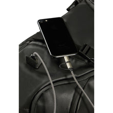 Load image into Gallery viewer, Close up to the USB plug with a cellphone connected. 

