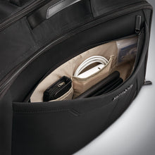 Load image into Gallery viewer, Interior view of the front panel&#39;s compartment with organization pockets. 
