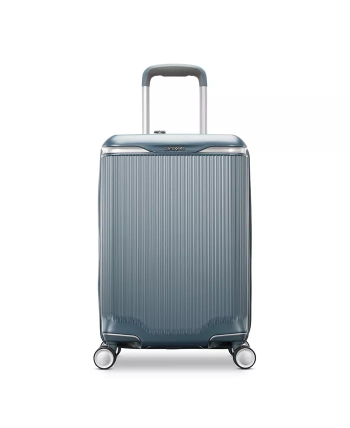 Front panel view of the slate blue suitcase. 
