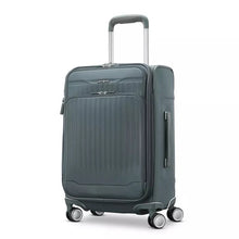Load image into Gallery viewer, Angled front panel view of the slate blue suitcase. 
