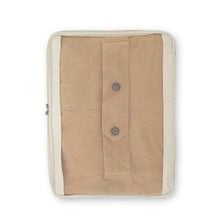 Load image into Gallery viewer, Front view of a packing cube with clothing folded inside. 
