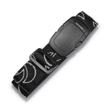 Load image into Gallery viewer, The black luggage strap with gray designs folded and placed on a white background. 
