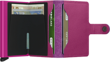 Load image into Gallery viewer, Interior view of the fuchsia mini wallet. The back of the mini aluminum card case features a money clip. 
