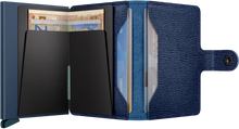Load image into Gallery viewer, Interior view of the navy blue card case. The back of the aluminum card case features a money clip. 
