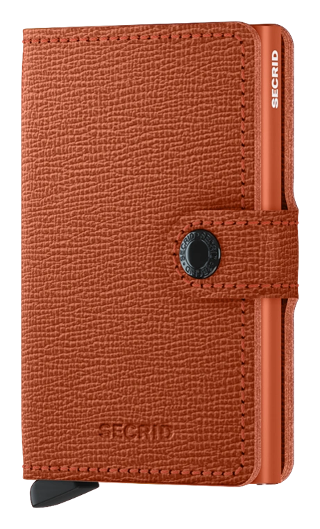 Angled front view of the pumpkin mini wallet. 