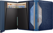 Load image into Gallery viewer, Interior view of the navy blue Crisple Slim wallet. The left side features a money clip, and the right side two credit card compartments. 
