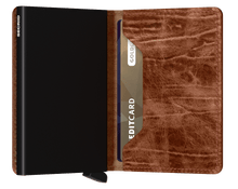 Load image into Gallery viewer, Interior view of the whiskey wallet. The aluminum card case is black. 
