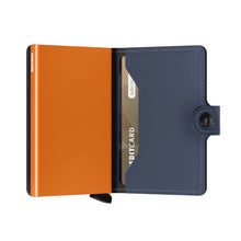 Load image into Gallery viewer, Interior view of the blue and orange wallet.
