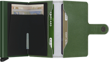 Load image into Gallery viewer, Interior view of the card case. The left side has a clip for bills, the right side two compartments to tuck cards in. 
