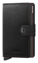 Load image into Gallery viewer, Angled front view of the black and brown mini wallet. It features a button closing strap. 
