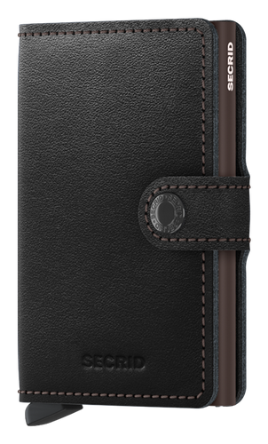 Angled front view of the black and brown mini wallet. It features a button closing strap. 