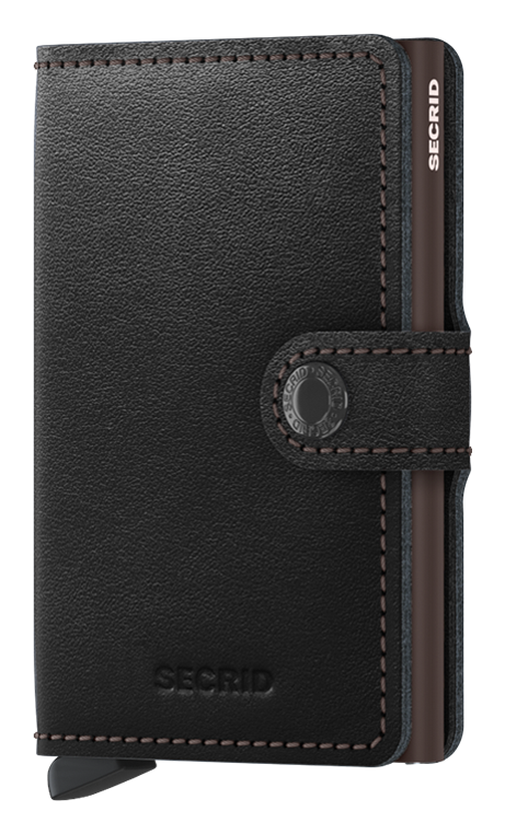 Angled front view of the black and brown mini wallet. It features a button closing strap. 