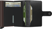 Load image into Gallery viewer, Interior view of the mini wallet. The back of the aluminum card case features a money clip. 
