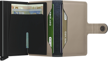 Load image into Gallery viewer, Interior view of the light sand colored card case. 
