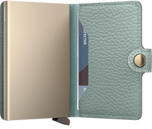 Load image into Gallery viewer, Interior view of the sea green mini wallet. 
