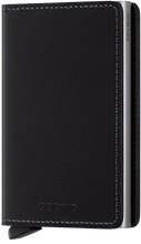 Load image into Gallery viewer, Angled front view of the black slim wallet. 
