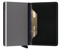 Load image into Gallery viewer, Interior view of the black slim wallet. The aluminum card case is gray. 
