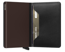 Load image into Gallery viewer, Interior view of the black and brown slim wallet. The aluminum card case is brown. 
