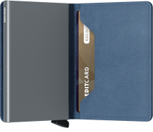 Load image into Gallery viewer, Interior view of the ice blue slim wallet. The aluminum card case is gray. 
