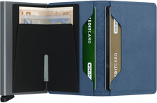Load image into Gallery viewer, Interior view of the ice blue slim wallet. The back of the aluminum card case features a money clip. 
