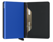 Load image into Gallery viewer, Interior view of the black and blue slim wallet. The aluminum card case is blue.
